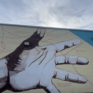Detail of hand in mural at Lawrence Heights