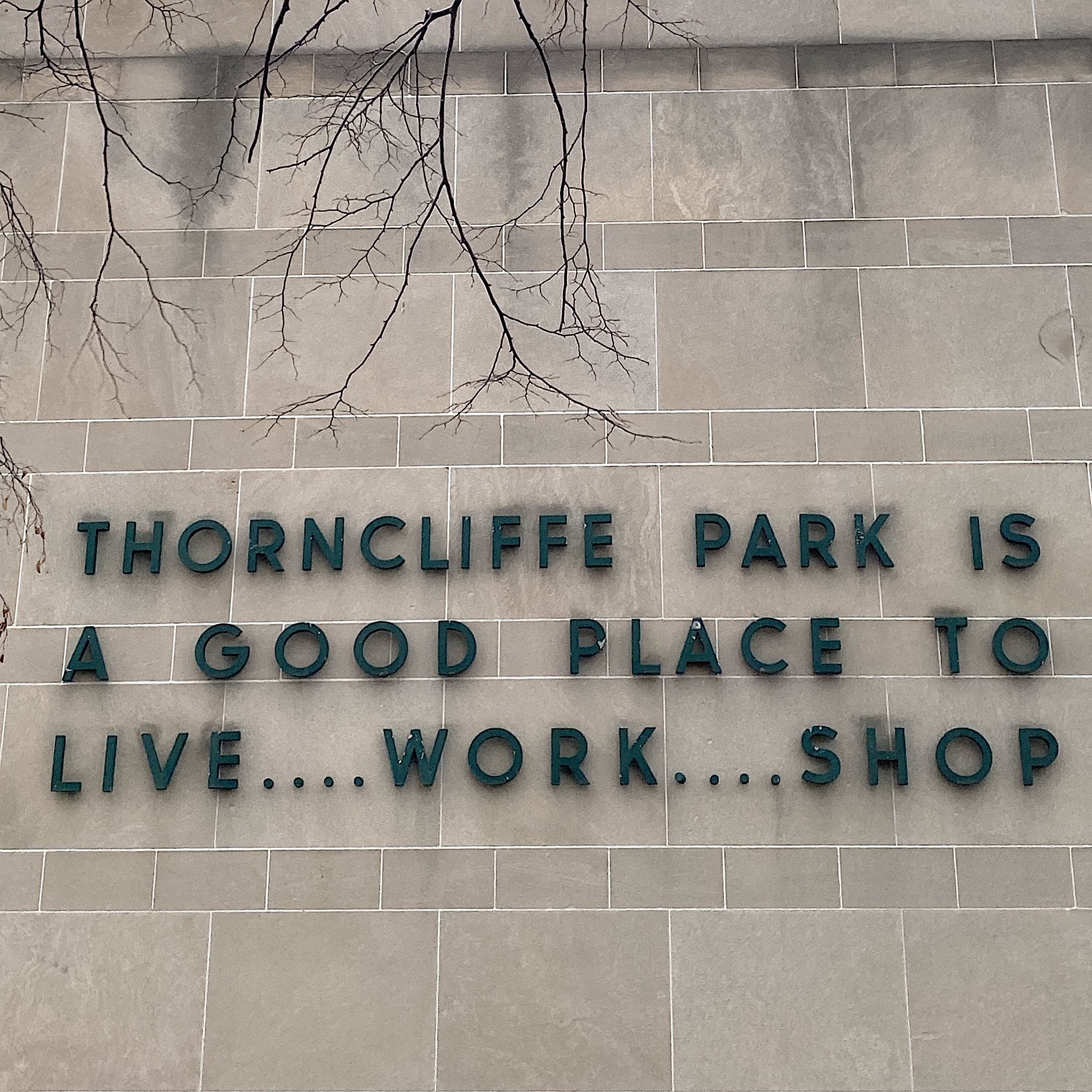 Mural that says: Thorncliffe Park is a good place to live..work...shop