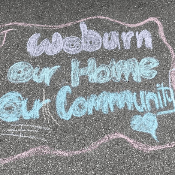 chalk drawing of "Woburn, Our home, Our community"