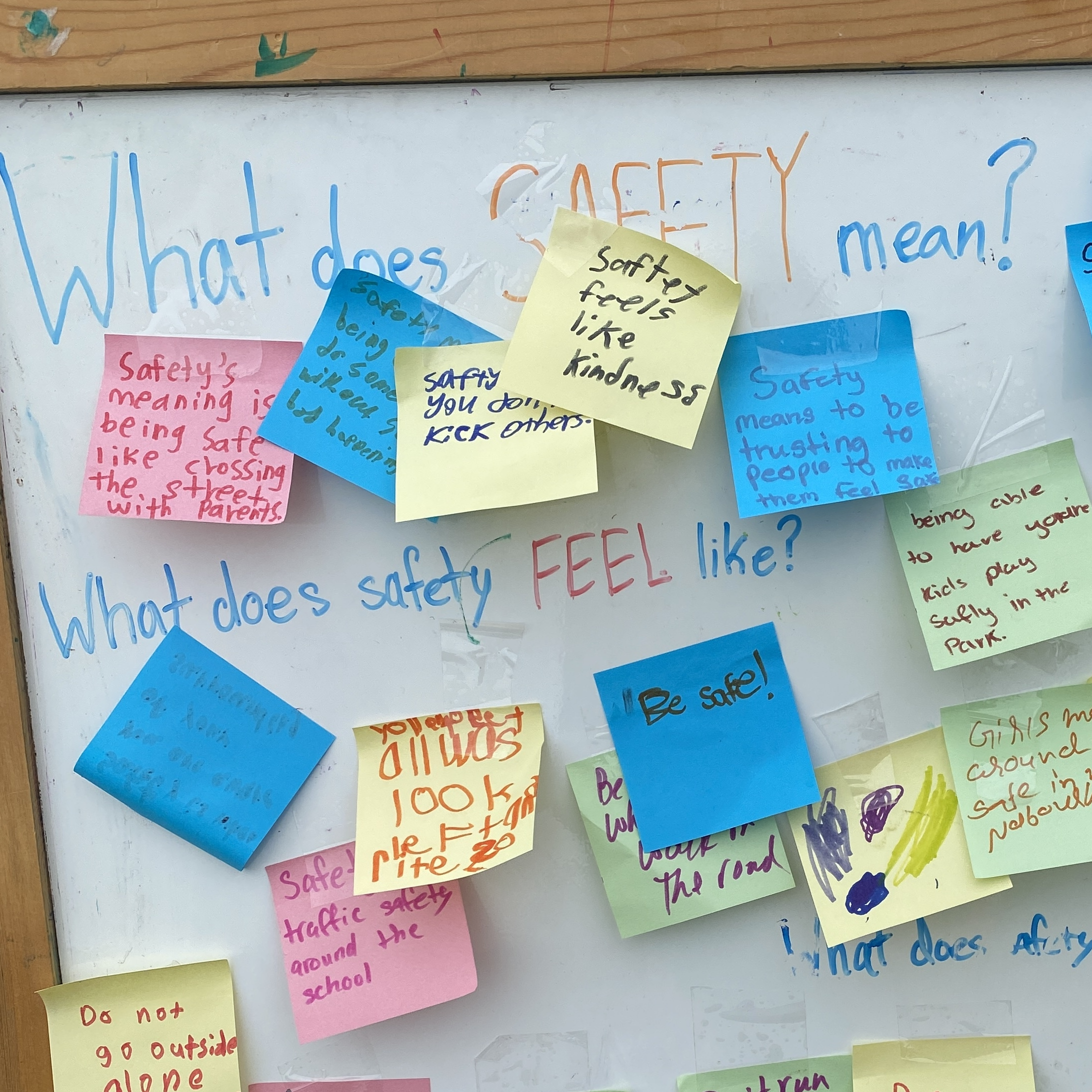 Community discussion board with stickies responding to "What does safety mean?" "What does safety feel like?"